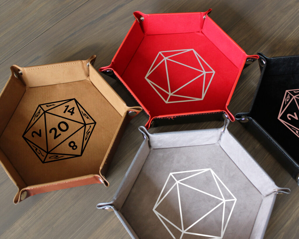 Hexagon snapping dice trays: Brown with black d20, red with silver d20, gray with white d20, black with rose gold d20